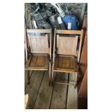 Two wooden folding chairs