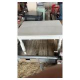 White table stands 26 inches tall