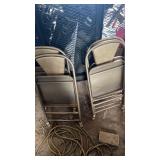 Four folding chairs