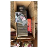 Larger assortment of eight track tapes, VHS and