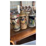 Several collectible beer STEINS