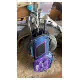 Golf bag with womenï¿½s golf clubs, including cobra
