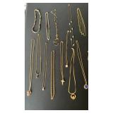 Large lot of gold color necklaces many with