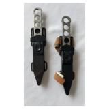 (2) stainless steel knives and pouches, one with