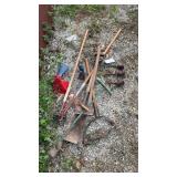 Garden tools, antique bells, bottle jack