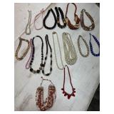 Large lot of beaded necklaces mostly short, some