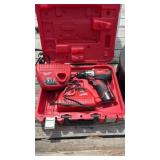 Milwaukee cordless drill and two chargers