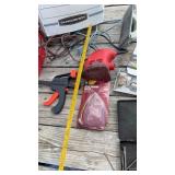 Assorted tools, including oil pans, sander,