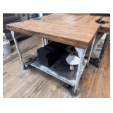 Butcher Block Top Work Table - Top is 48” x 30” - Butcher Block is just shy of 3” Thick - Counter Height is 35.5” - Can Opener Mounted on Side - Metal Base