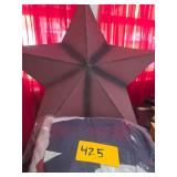 4 half round, pleated flags (faded) and a large metal star.