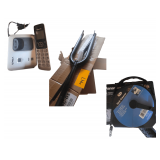 Vtech cordless phone, bike fork, Lumilite lg flash light, and a sink snake