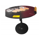 Small black bistro table and storage bench