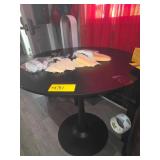 Small black bistro table and storage bench