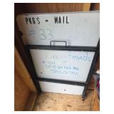 Porcelain table top used as dry erase board. Sign holder tent style