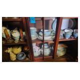 Shelf of Various Glassware