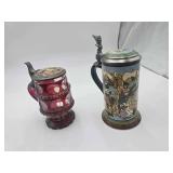 Ruby Red Glass German Beer Stein 7”H. Mettlach Peter Pan German Beer Stein 9”H.