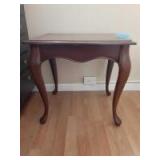 Small 8x11 square wooden table with French legs. 2 sides have pull out attachment Small 8x11 square wooden table with French legs. 2 sides have pull out attachment
