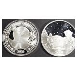 (2) 1 OZ .999 SILV 2023 XMAS SLED&BABYS 1ST ROUNDS