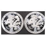 (2) 1 OZ .999 SILVER YEAR OF THE DRAGON ROUNDS (2) 1 OZ .999 SILVER YEAR OF THE DRAGON ROUNDS