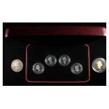 6 FOREIGN STERLING SILVER COINS