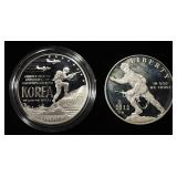 (2) PROOF COMMEMORATIVE DOLLARS