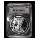 2009 CARR PROOFED OVERSTRIKE SILVER EAGLE