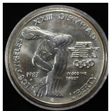 1983-D $1 COMMEM DISCUS THROWER