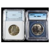 (2) GRADED KENNEDY HALF DOLLARS