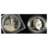 (2) PROOF COMMEMORATIVE  DOLLARS