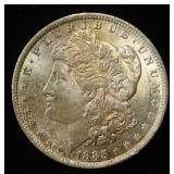 1885-O MORGAN DOLLAR CH BU TONED