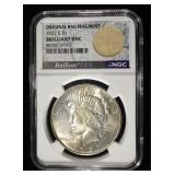 1927-S PEACE DOLLAR NGC BU WITH BAG FRAGMENT