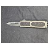 Clone of a Titan OTF Automatic Knife - Gray