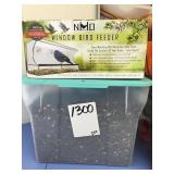 Window bird feeder with sunflower seeds