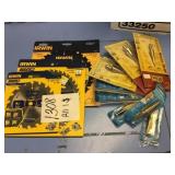 Step bits and saw blades