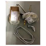 Faucet and adjustable shower wall bracket