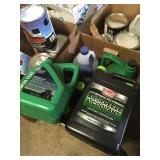 Box of hydraulic fluid and antifreeze