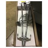 Transitional floor mount bathtub faucet.