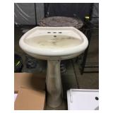 Pedestal sink.