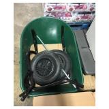 Green plastic  wheel barrow