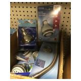 Box of Assorted Showerheads and Arms