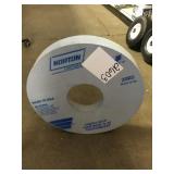 Norton industrial grinding wheel.