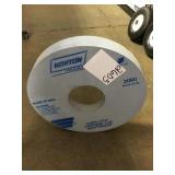 Norton industrial grinding wheel.