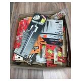 Mixed tray of drill bits, taps and dies.