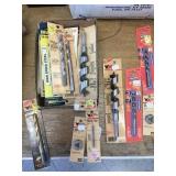 Mixed tray of drill bits.