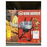 Multipurpose portable propane outdoor cooker.