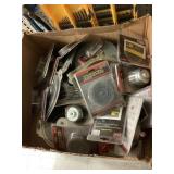 Box of emery cloth, wire wheels and more.