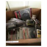 Emery cloth, wire brushes and grinding wheels