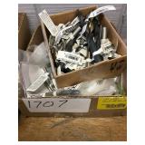 box of drill bits and drill extractors.