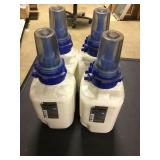 four bottles Gojo Skin Conditioner cartridges