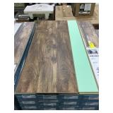 12MM Laminate floor w/pad x 672 sq ft.